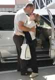 Melissa Joan Hart kissing a dude at the LA International airport